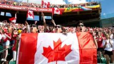 Fans cheer for Team Canada as they take on Team China during a FIFA Women's World Cup soccer match in Edmonton, Alberta, on Saturday June 6, 2015. (Jason Franson/The Canadian Press via AP) MANDATORY CREDIT