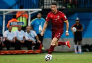 Jun 22, 2014; Manaus, Amazonas, BRAZIL; Portugal forward Cristiano Ronaldo (7) carries the ball during their 2014 World Cup game against the United States at Arena Amazonia. Mandatory Credit: Winslow Townson-USA TODAY Sports