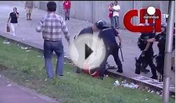 [Watch] Portuguese police beat football fan in front of